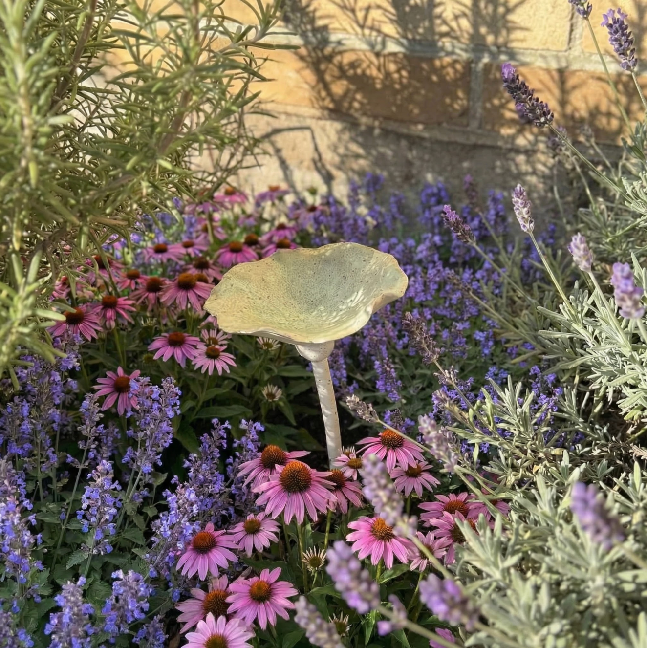 Handmade ceramic bee bowl with garden stake